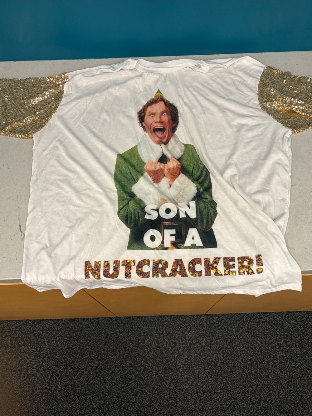 Elf 'Son of a Nutcracker!' Top with gold sequin sleeves